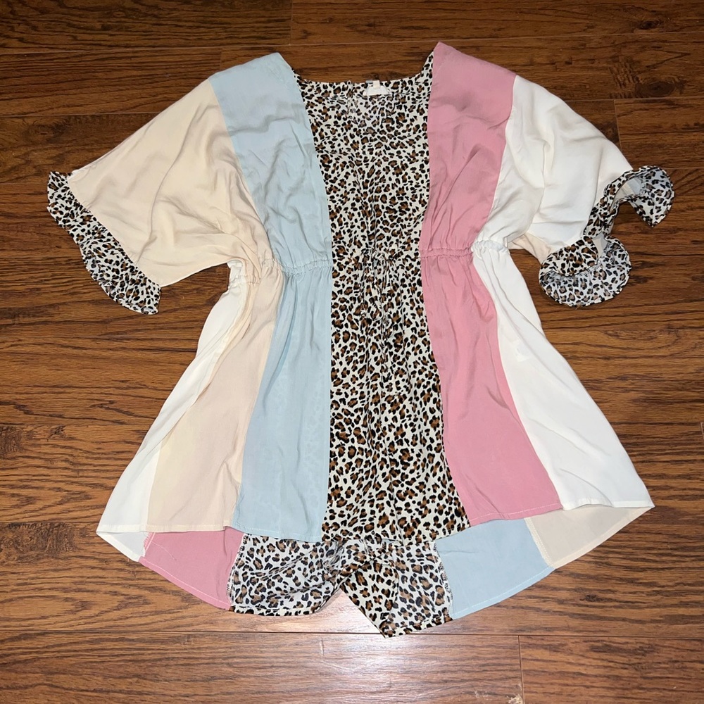 Cheetah Romper size medium